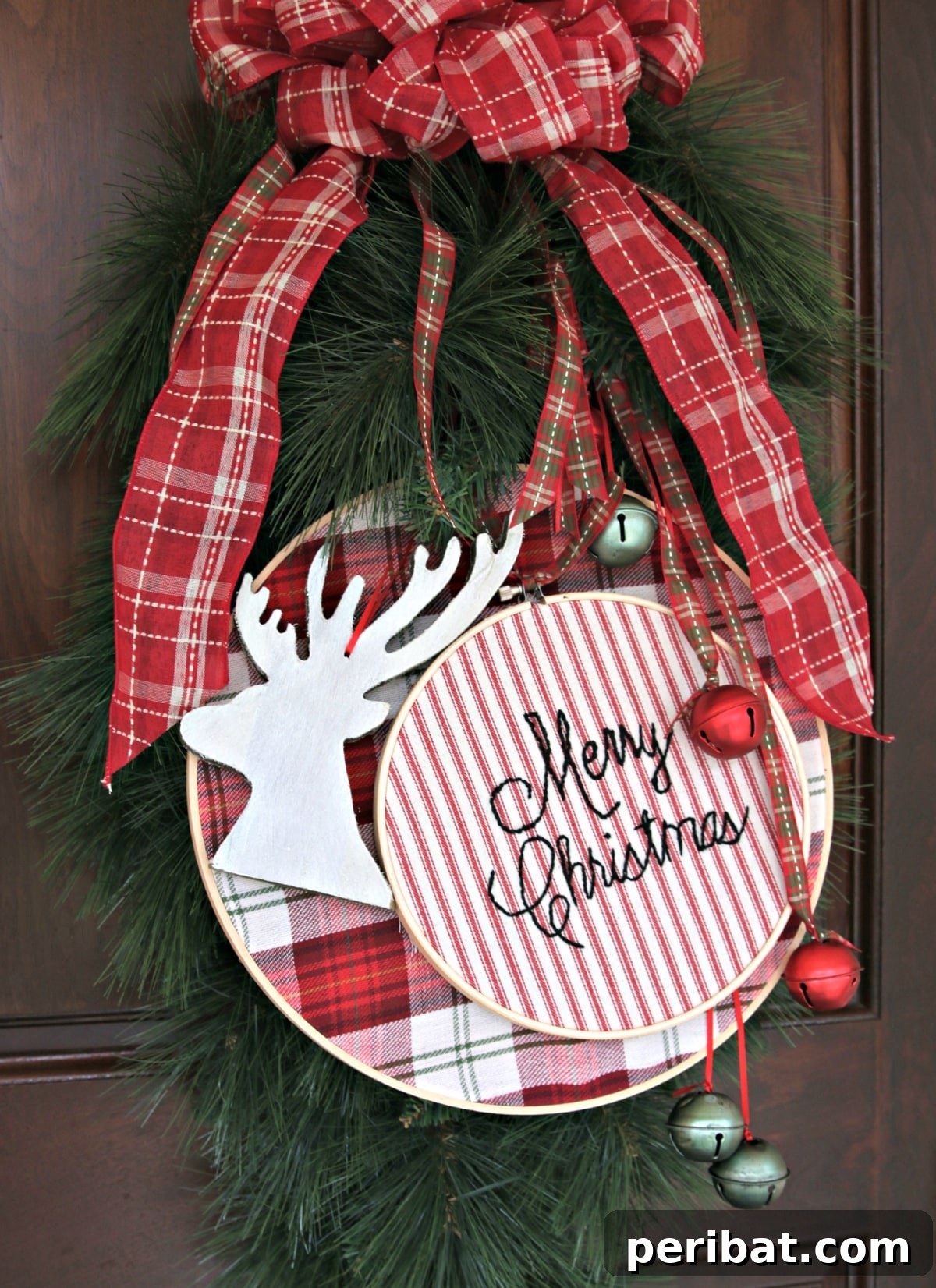 Stitch Your Way to a Merry Christmas: 48 DIY Embroidery Designs 49 A festive jingle bell wreath embroidery, bringing cheerful sounds and sights to holiday decor.
