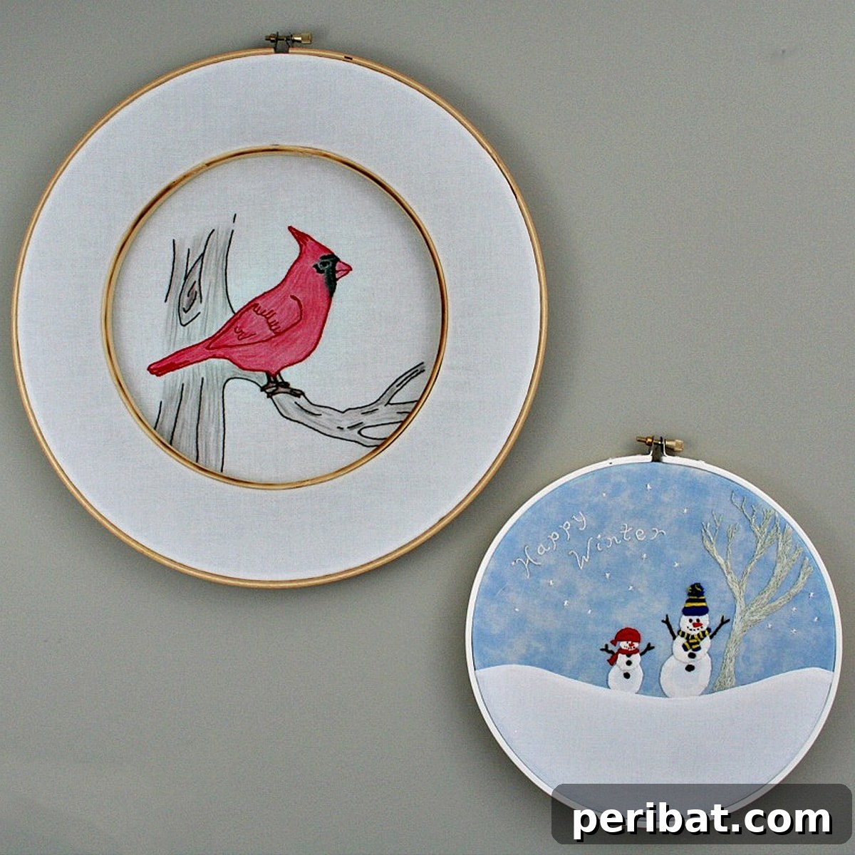 Stitch Your Way to a Merry Christmas: 48 DIY Embroidery Designs 10 A cheerful embroidered snowman and bird scene, bringing winter joy indoors.