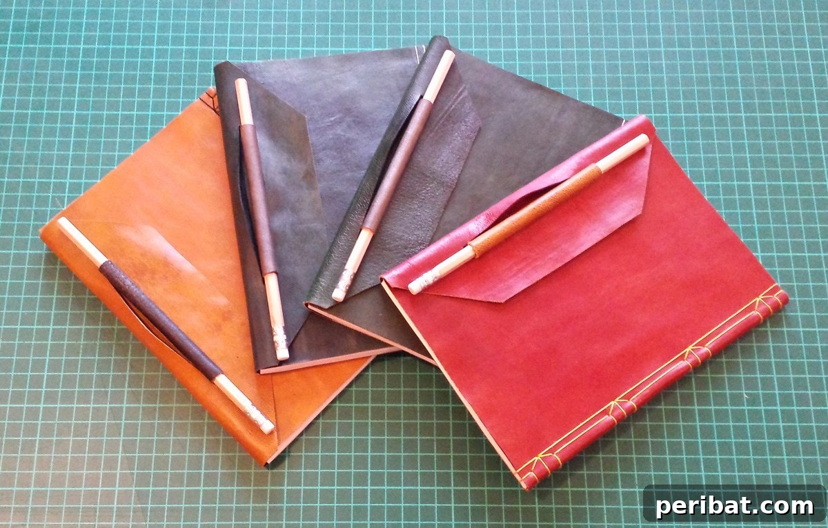 Bind Your Own Books 21 Creative DIY Projects 3 four leather notebooks on table