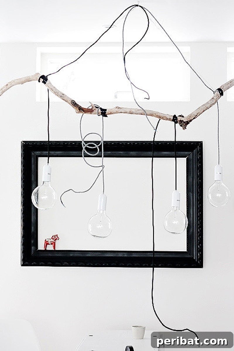 simple tree branch into a unique and stylish pendant light