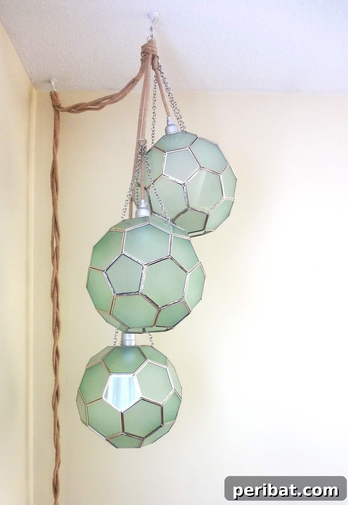 three honeycomb pendant lights