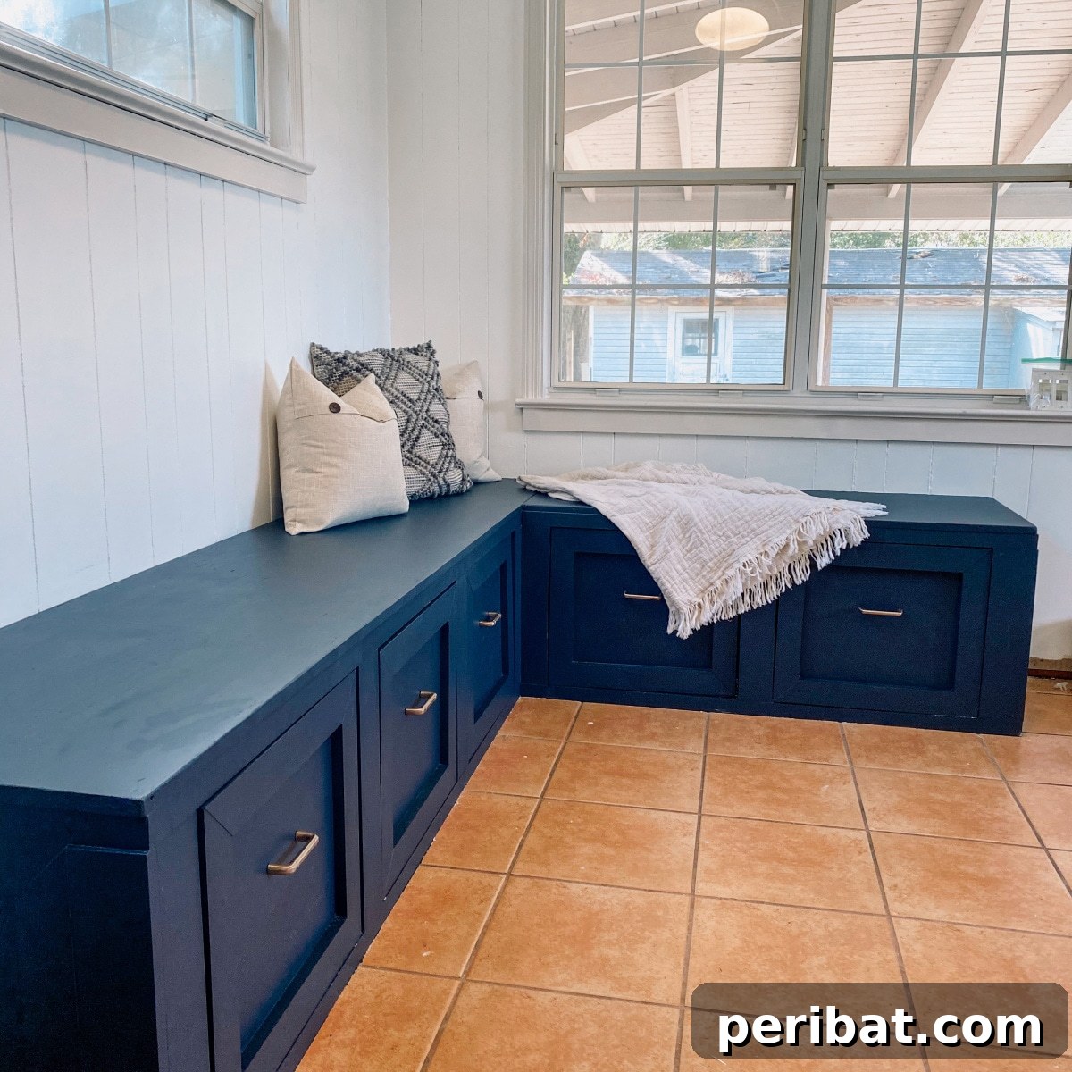 Craft Your Perfect Breakfast Corner 10 blue breakfast nook with orange tile background