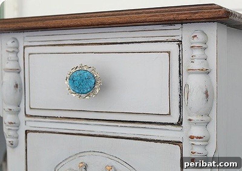 An eye-catching door knob crafted from old, repurposed jewelry, gleaming with sparkle.