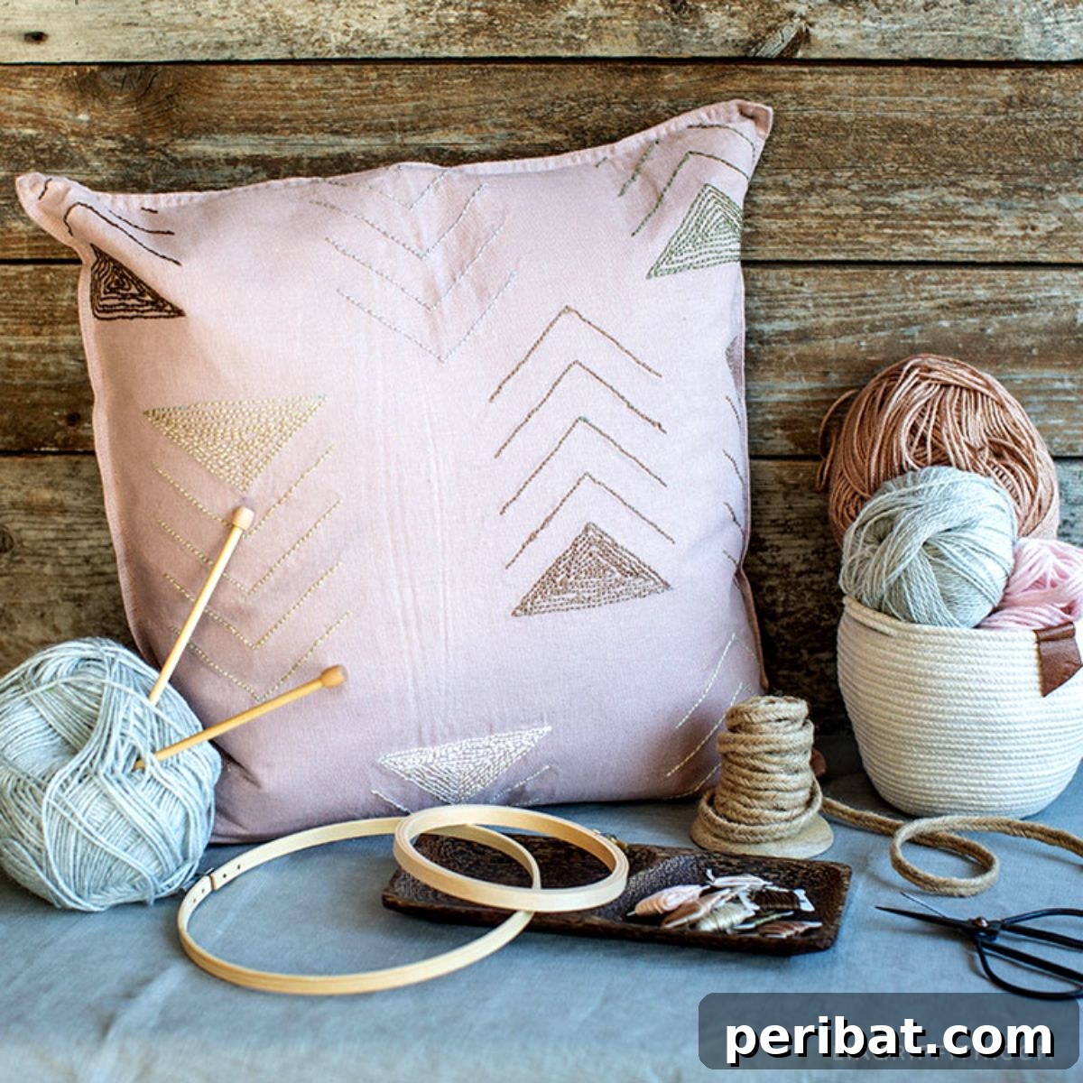 Tutorial for making a DIY punch needle pillow cover, perfect for upgrading old cushions.