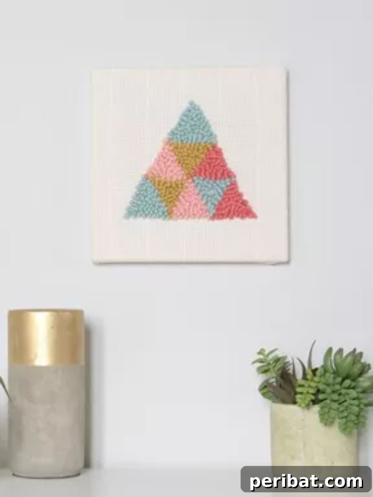 Guide to creating DIY geometric punch needle art for various home decor applications.