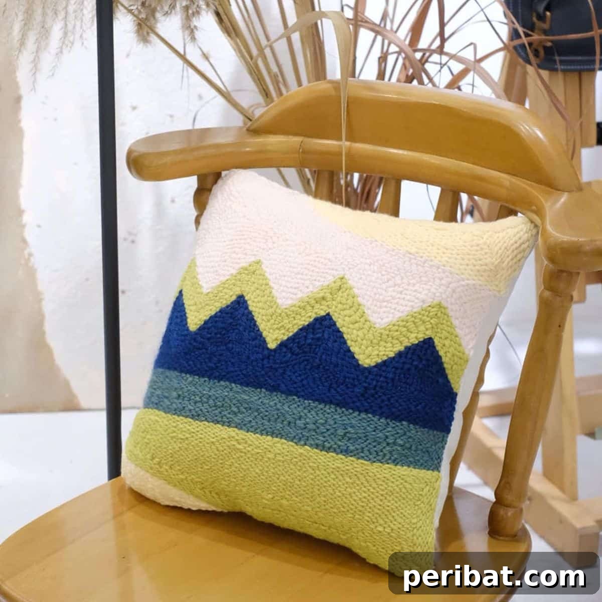 Wool Queen punch needle DIY kit for creating throw pillows and rugs, with pre-printed fabric and yarn.
