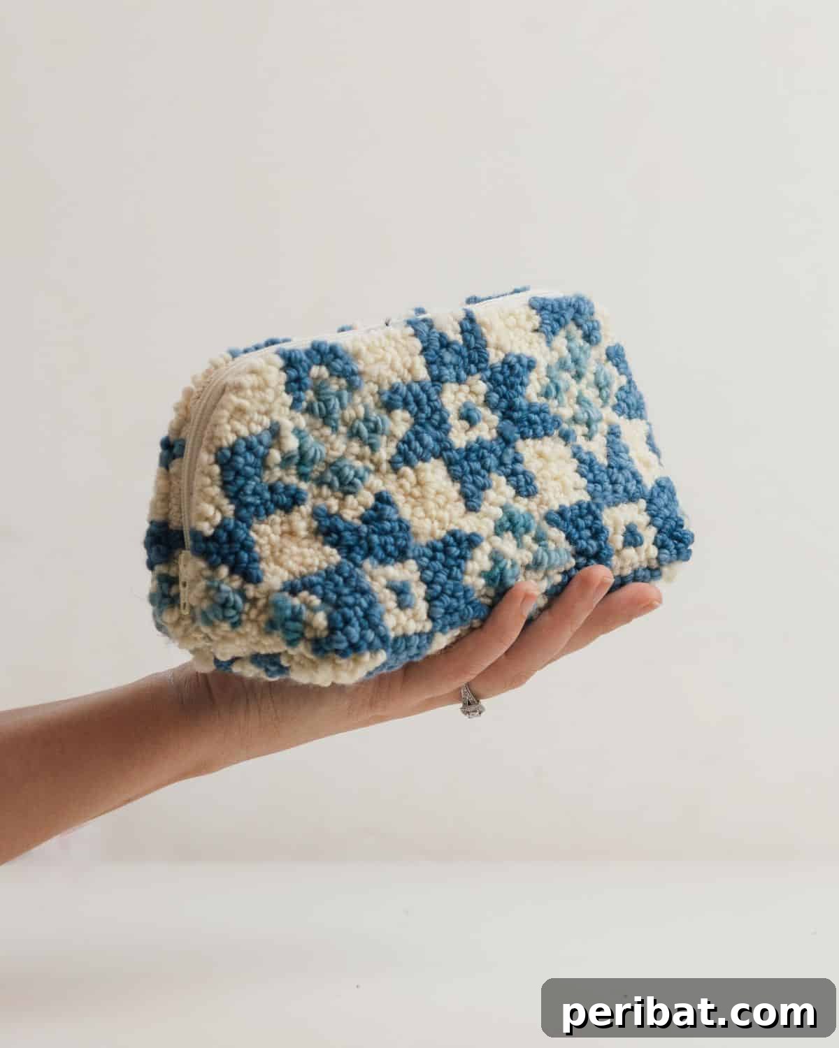 Tutorial for creating a stylish and functional punch needle pouch.