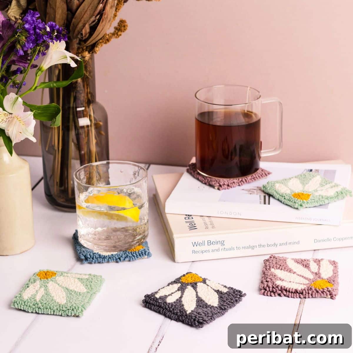 DIY guide for making colorful punch needle coasters to refresh your dining table.