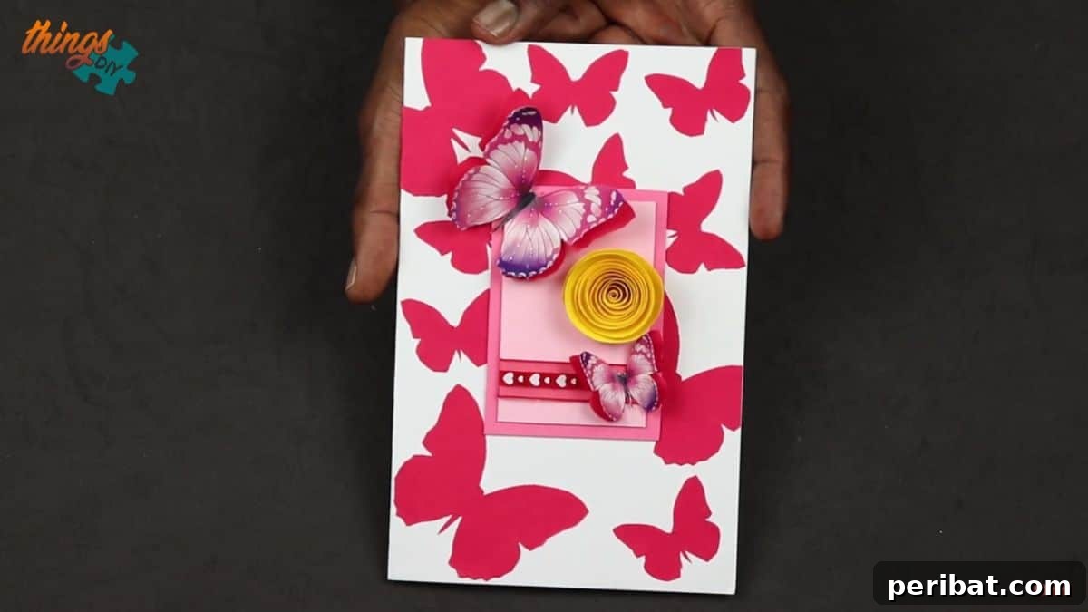 Charming DIY Greeting Card featuring printed butterfly images and glued-on colorful paper flowers