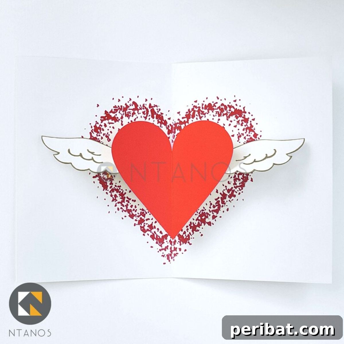 Surprising DIY Valentine’s Day Pop-up Card, appearing simple on the outside but revealing a vibrant 3D heart inside