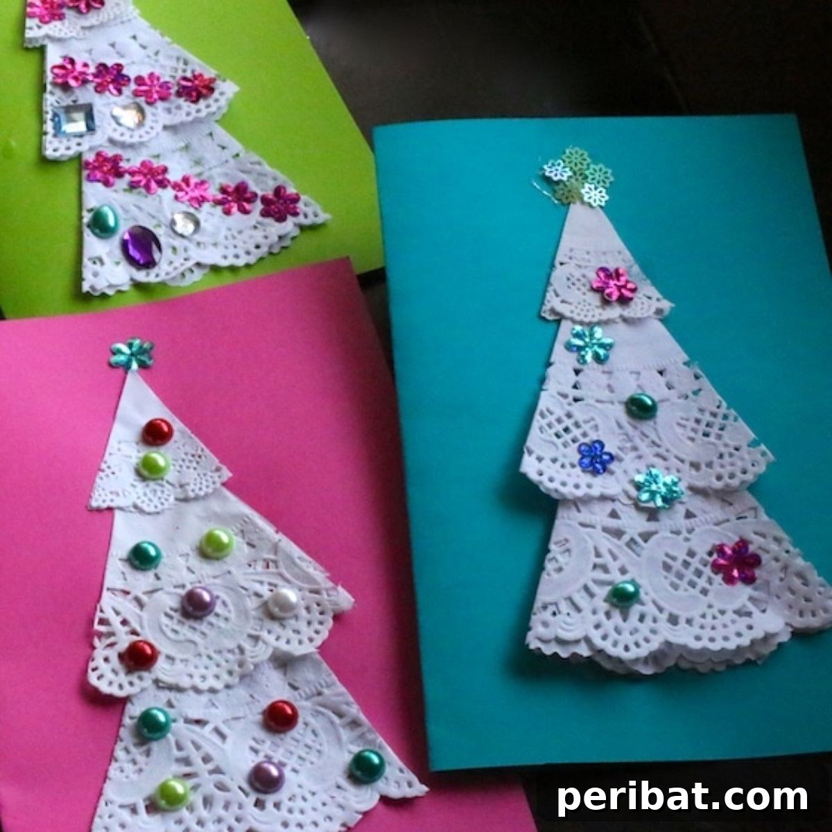 Adorable Doily Christmas Tree Cards, perfect for kids to craft using doilies and colorful cardstock