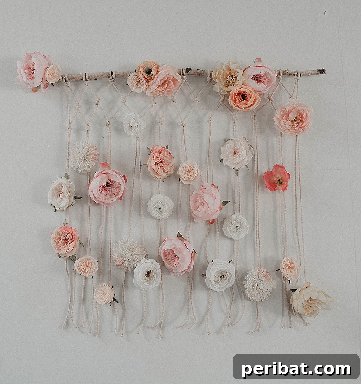 macramé wall hanging with flowers