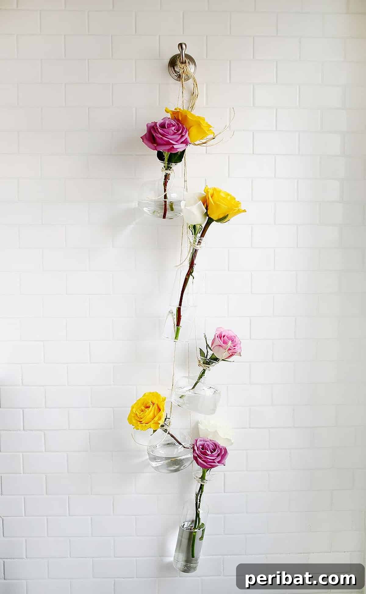 hanging vase display with flowers