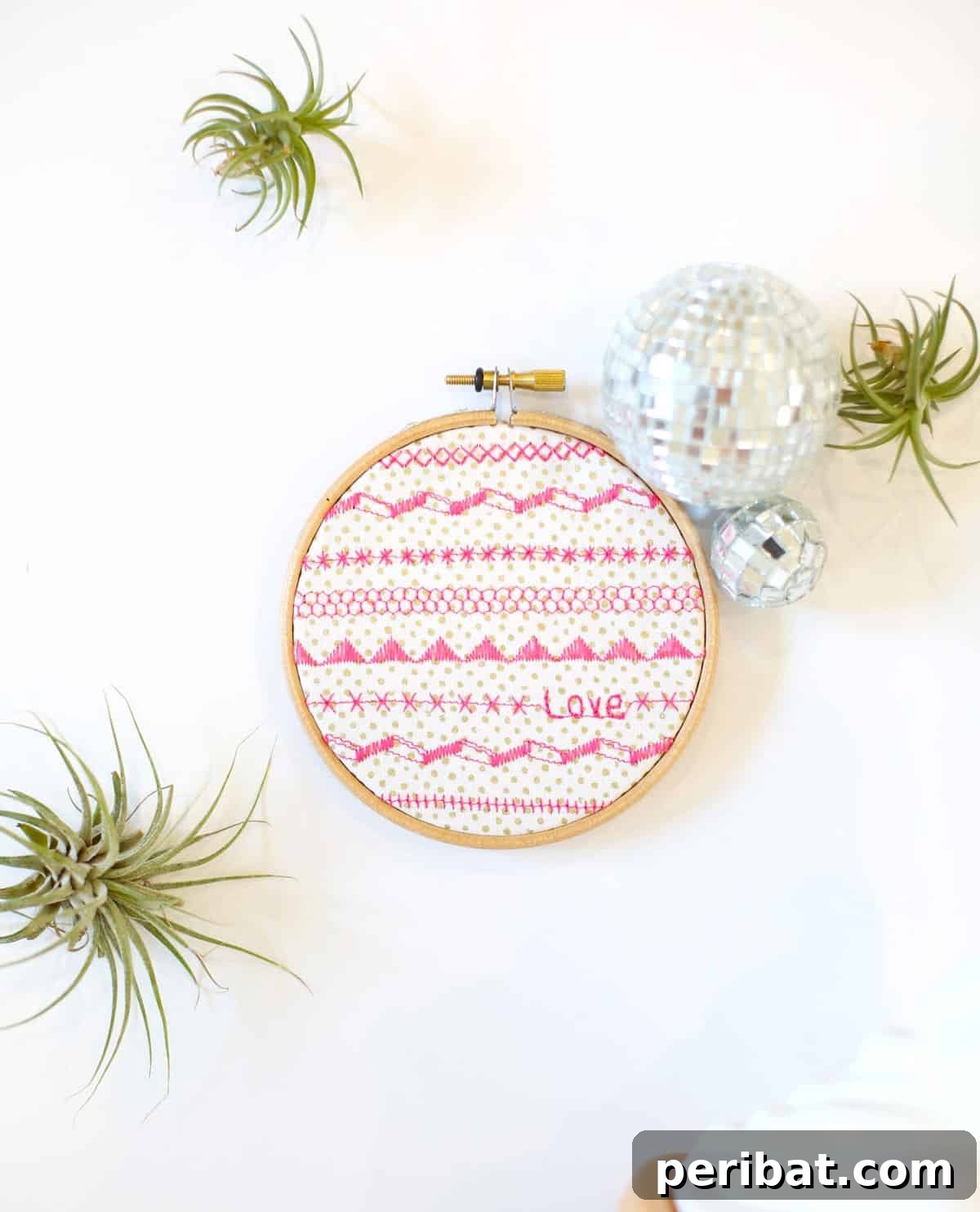 faux-embroidered hanging wall art