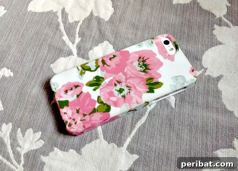 Your Phone Your Canvas 45 DIY Case Crafts 25 A simple and sweet phone case cover, adorned with a delicate floral pattern and a ribbon detail, exuding an elegant and charming aesthetic.