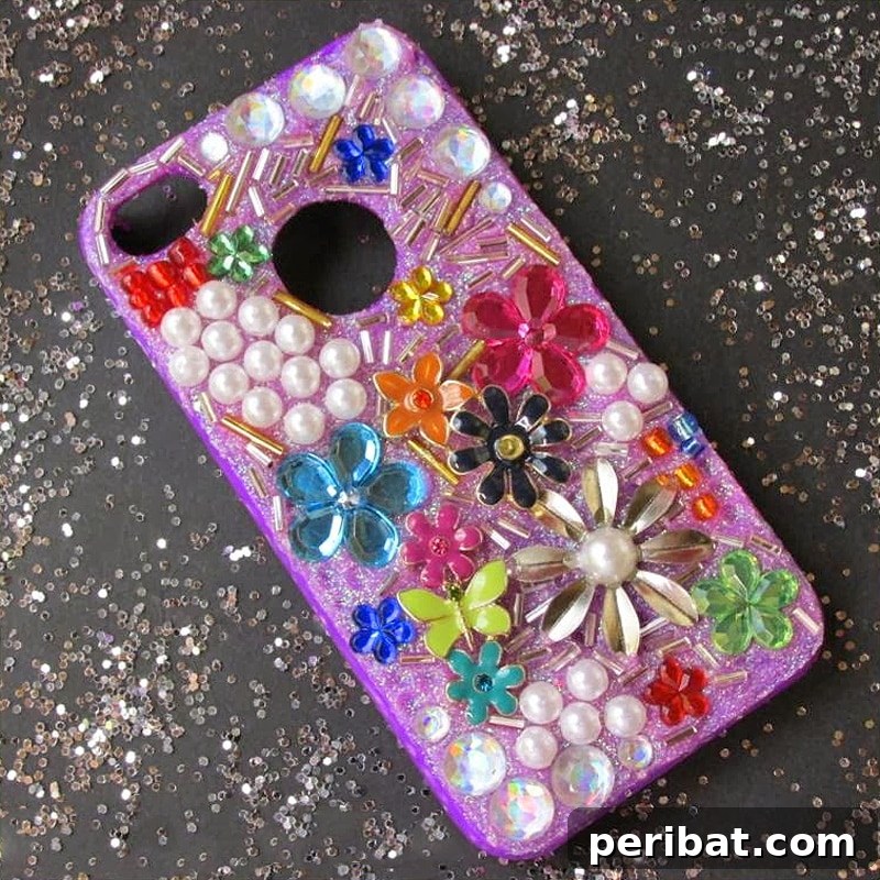 Your Phone Your Canvas 45 DIY Case Crafts 32 A glamorous phone case, intricately embellished with shimmering jewels, glitter, and beads, designed to dazzle and capture attention.