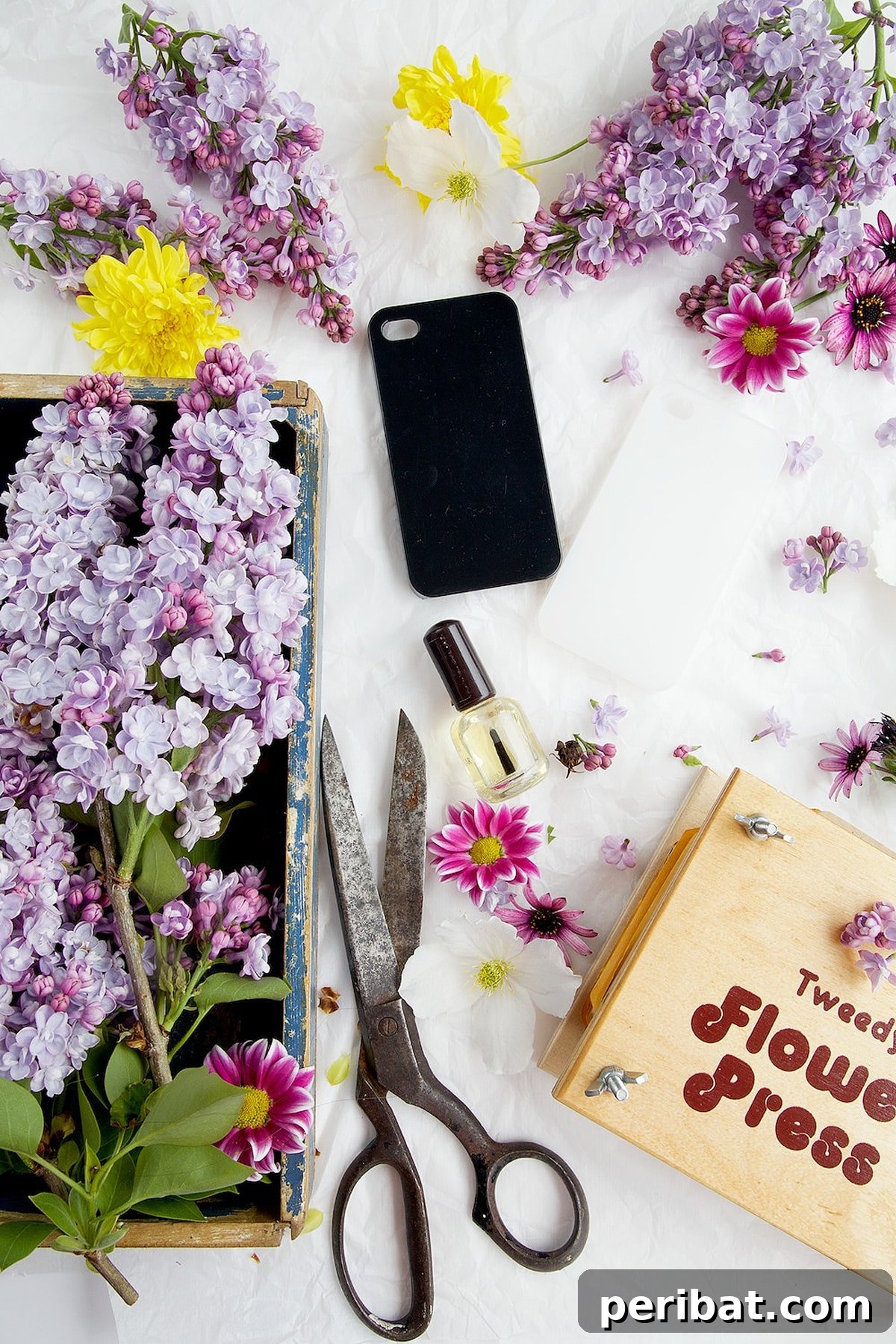 Your Phone Your Canvas 45 DIY Case Crafts 7 An exquisite phone case delicately adorned with an array of pressed flowers, creatively arranged to form a beautiful, natural design.