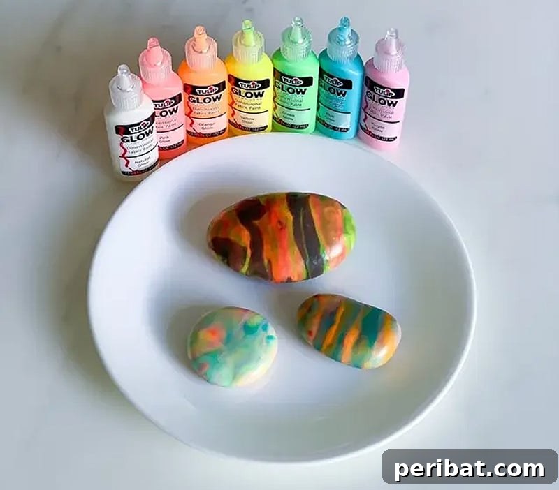 Creative Painted Rocks: Ideas, Projects, and Starter Kits 30 Rocks with marbled patterns that glow in the dark