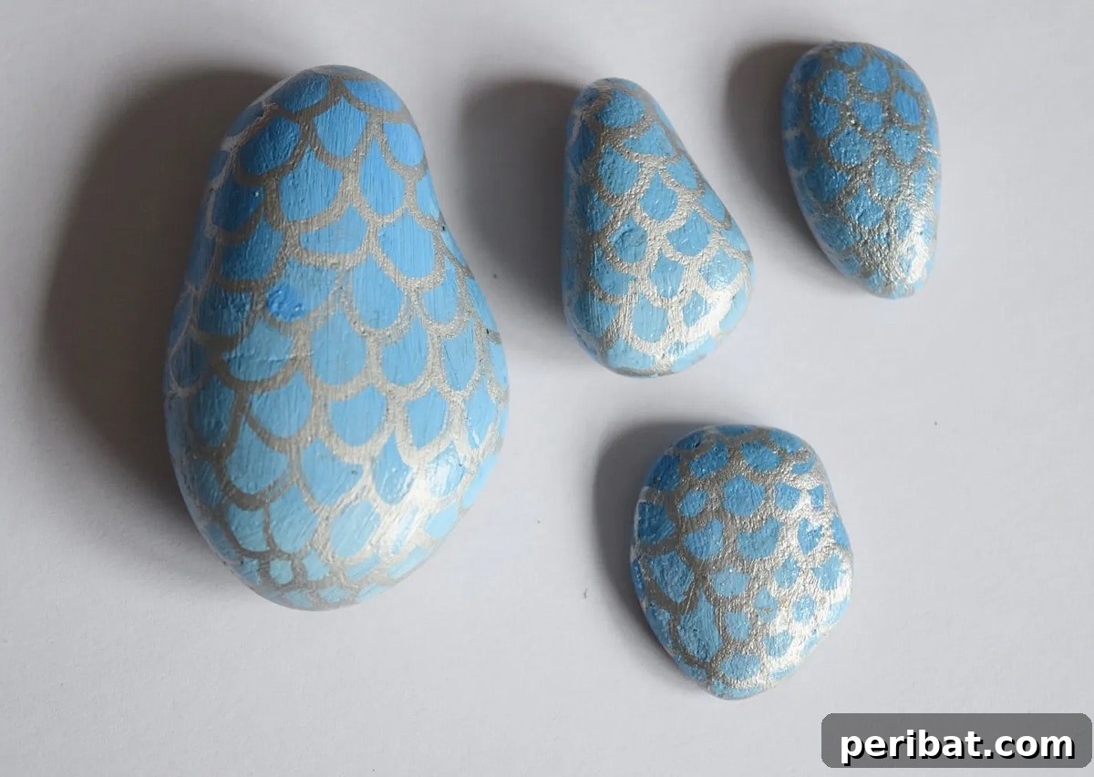 Creative Painted Rocks: Ideas, Projects, and Starter Kits 36 Enchanting mermaid-themed painted rocks with scales and tails