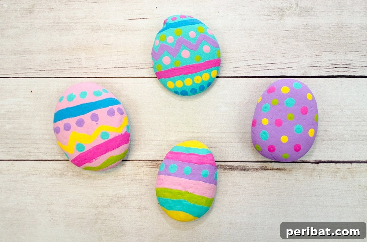Creative Painted Rocks: Ideas, Projects, and Starter Kits 42 Vibrantly painted Easter egg rocks with various patterns