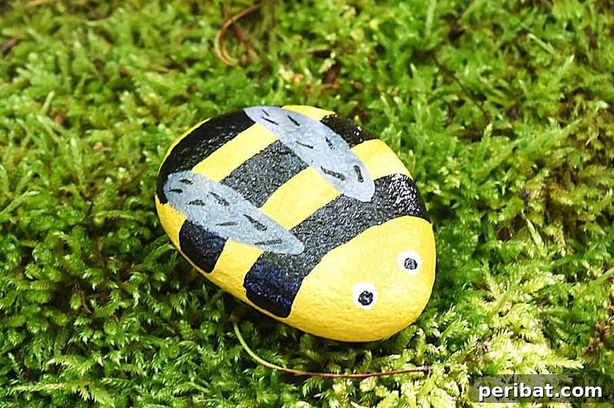 Creative Painted Rocks: Ideas, Projects, and Starter Kits 10 Close-up of a cute hand-painted bee rock