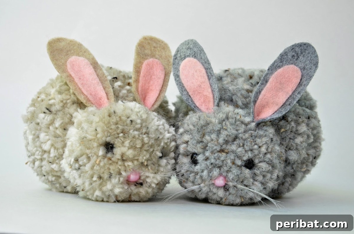 A collection of cute, soft bunny pom poms with felt ears, designed for party decorations or crafts.