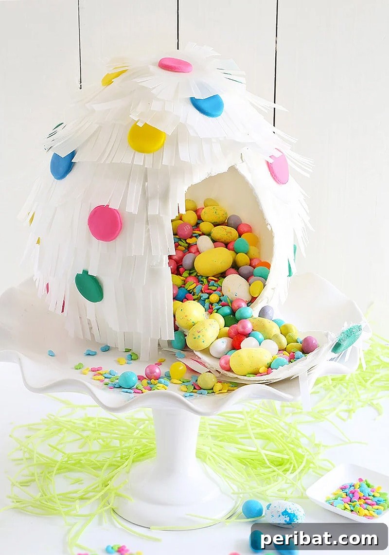 Stunning edible paper mache Easter egg piñata filled with sweet treats