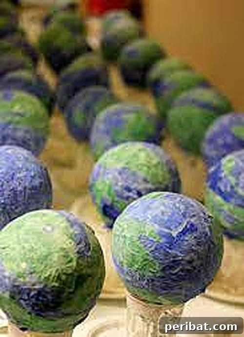 Radiant paper mache globes illuminated from within, creating a warm glow