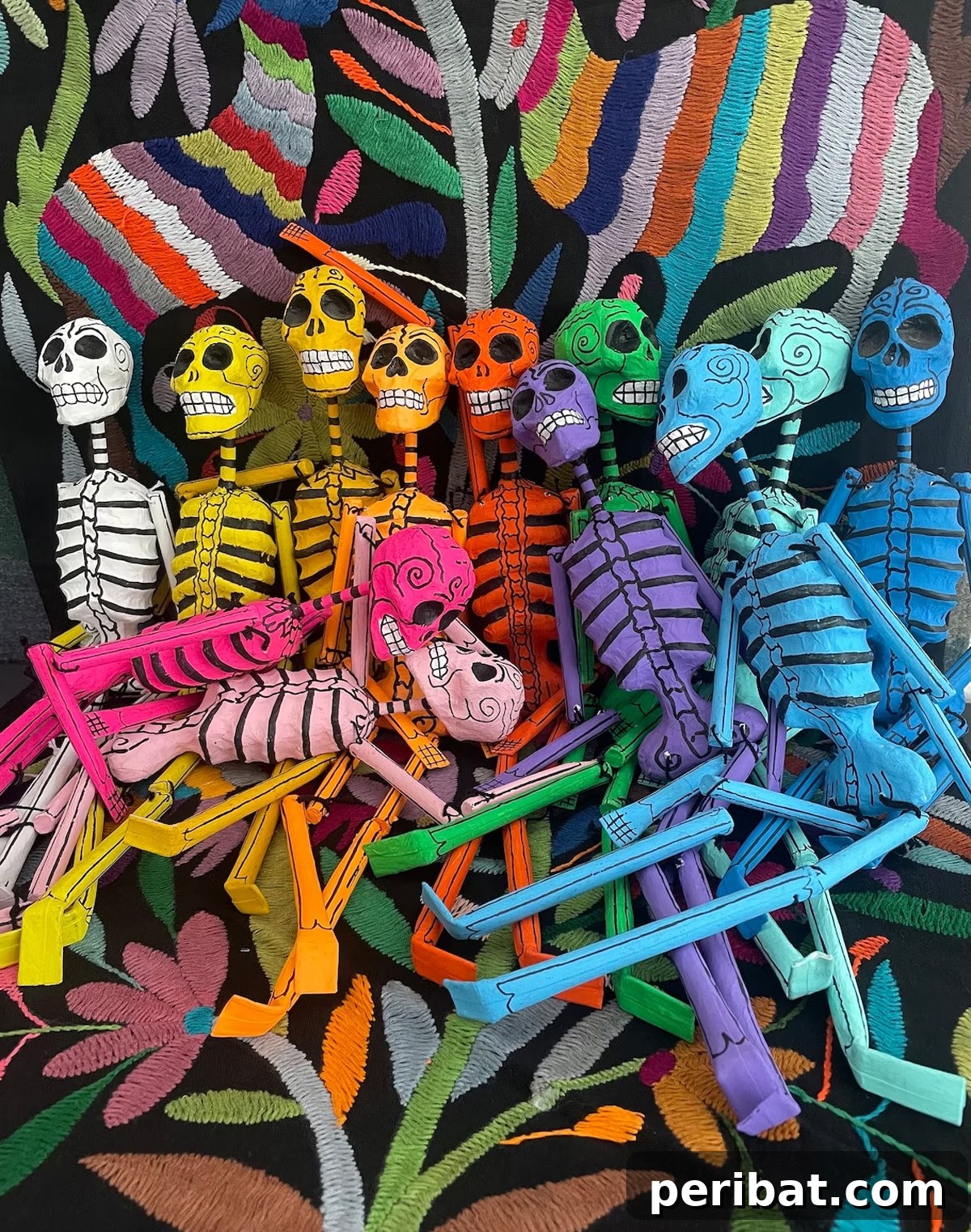 Detailed Mexican paper mache skeleton figure showcasing vibrant folk art