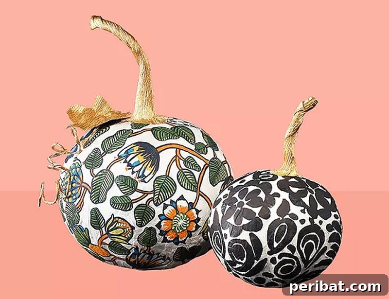 Durable paper mache pumpkins adorned with patterned napkins and crafted stems, lasting indefinitely