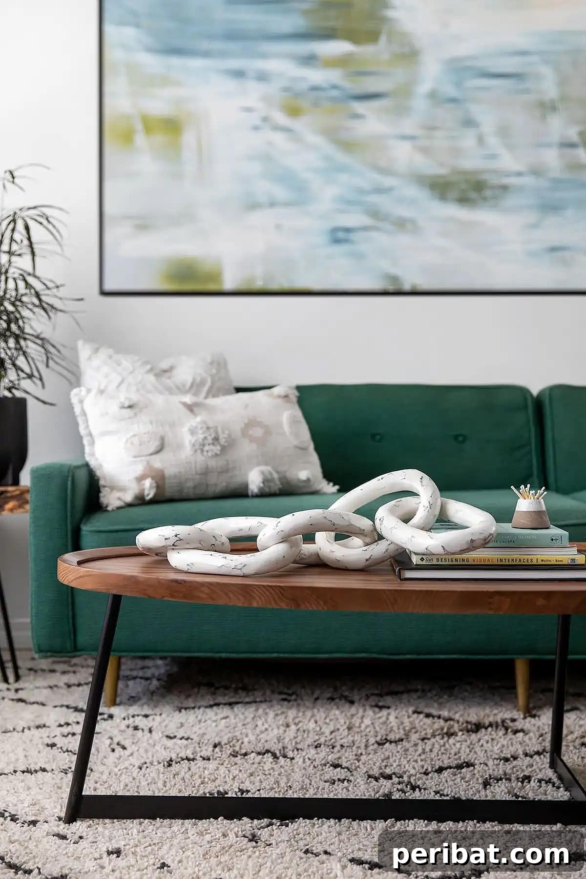 Stylish faux marble paper mache chain decor on a coffee table