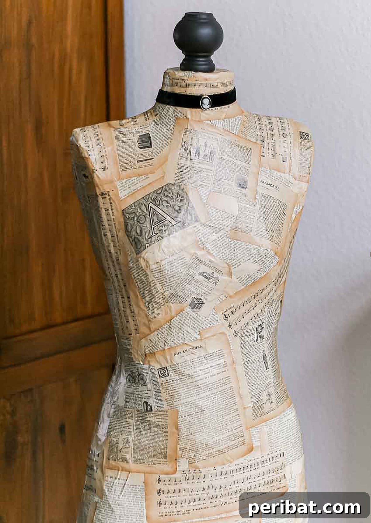 DIY dress form crafted with duct tape and paper mache