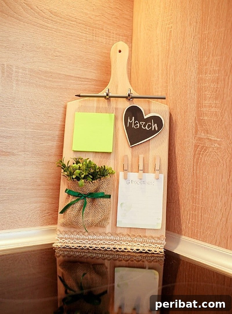 27 Creative DIY Pinboard Projects 3 Rustic upcycled wooden cutting board command station with chalkboard heart and burlap pouch
