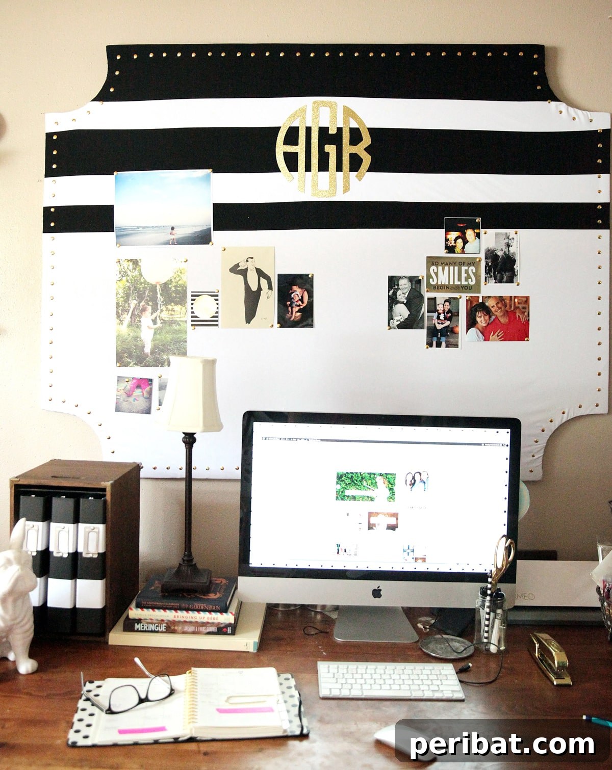 27 Creative DIY Pinboard Projects 10 Large, inexpensive DIY pinboard on a desk made with foam insulation and fabric