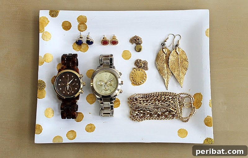 42 Creative DIY Serving Tray Projects 26 Chic Kate Spade inspired DIY jewelry tray with glittery gold dots on a matte background