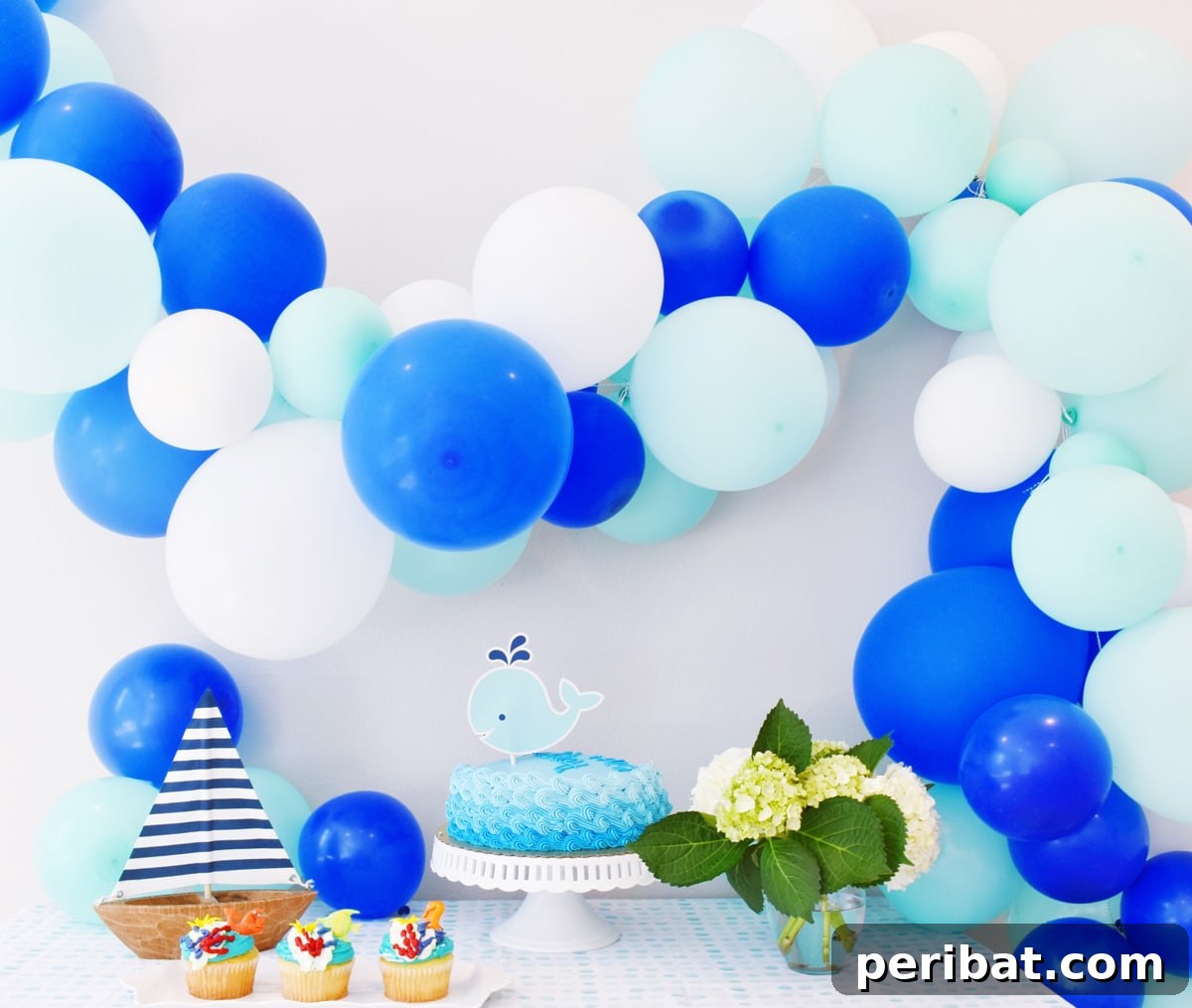 Stunning DIY Balloon Garlands: 27 Ideas & Starter Kits 11 enchanting balloon garland in oceanic hues