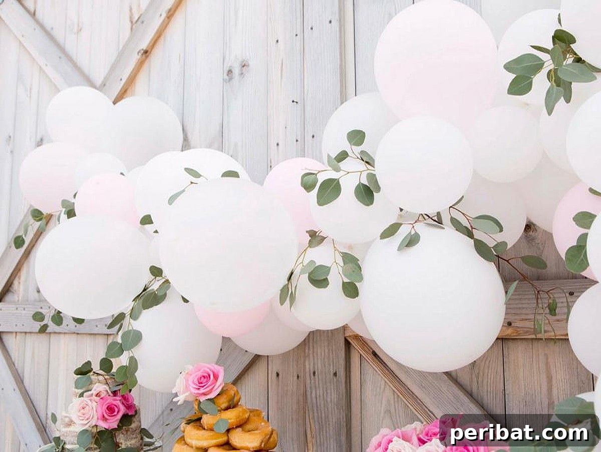 Stunning DIY Balloon Garlands: 27 Ideas & Starter Kits 8 balloon garland for rustic barn wedding