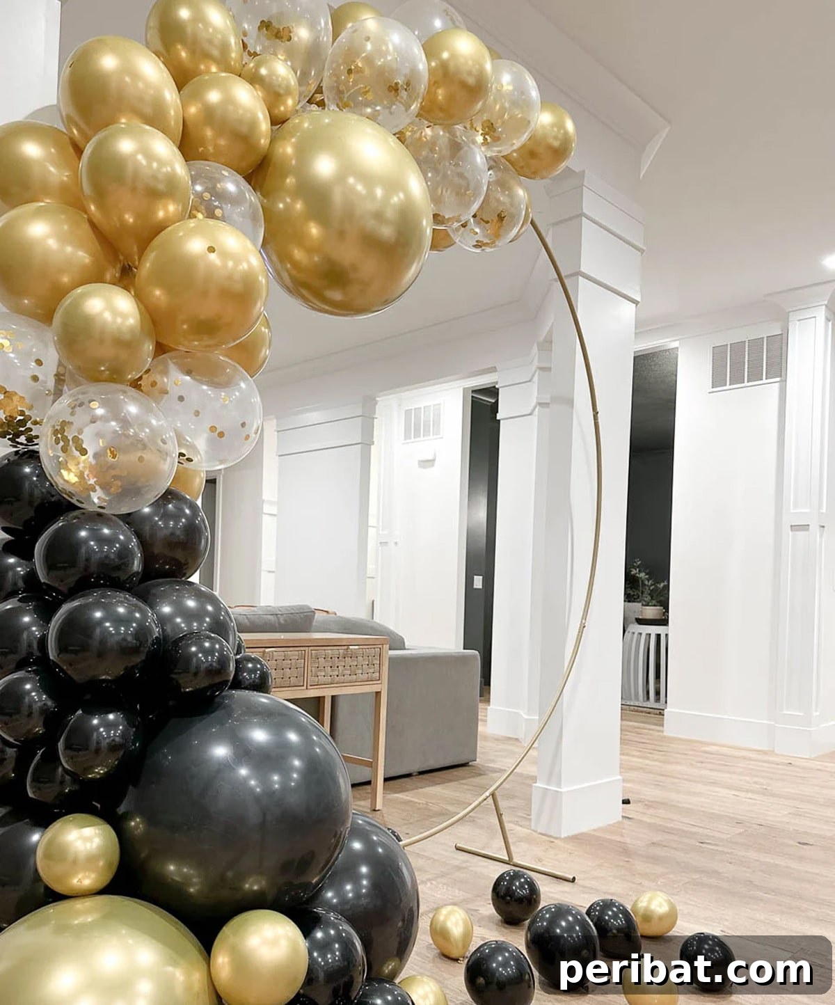 Stunning DIY Balloon Garlands: 27 Ideas & Starter Kits 10 indoor black and gold balloon ring