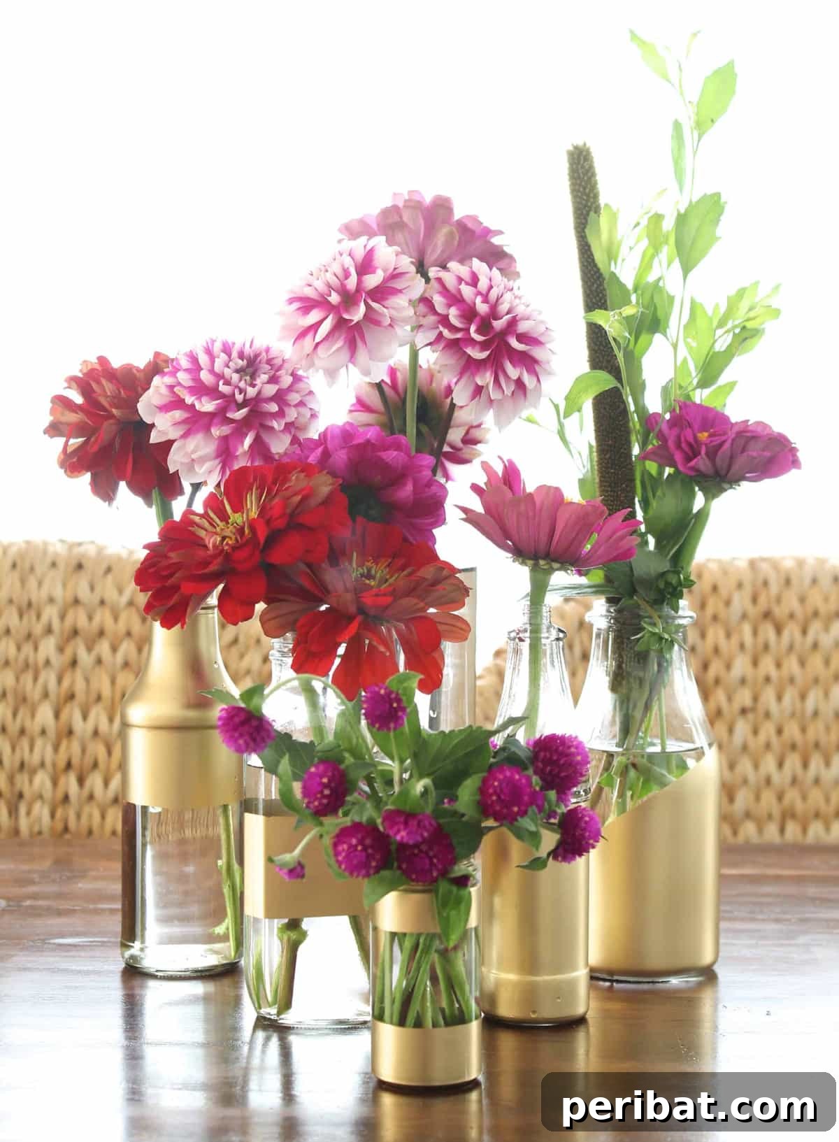 DIY gilded vases crafted from condiment bottles for a touch of glamour