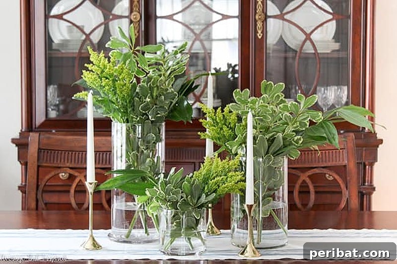 Lush DIY greenery centerpiece using affordable grocery store foliage