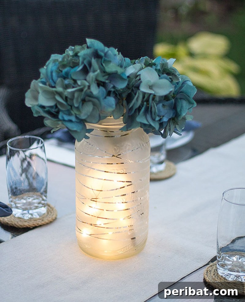 Charming DIY frosted glass jar lantern for an elegant wedding ambiance