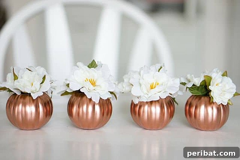 Elegant copper pumpkin centerpiece crafted from dollar store pumpkins