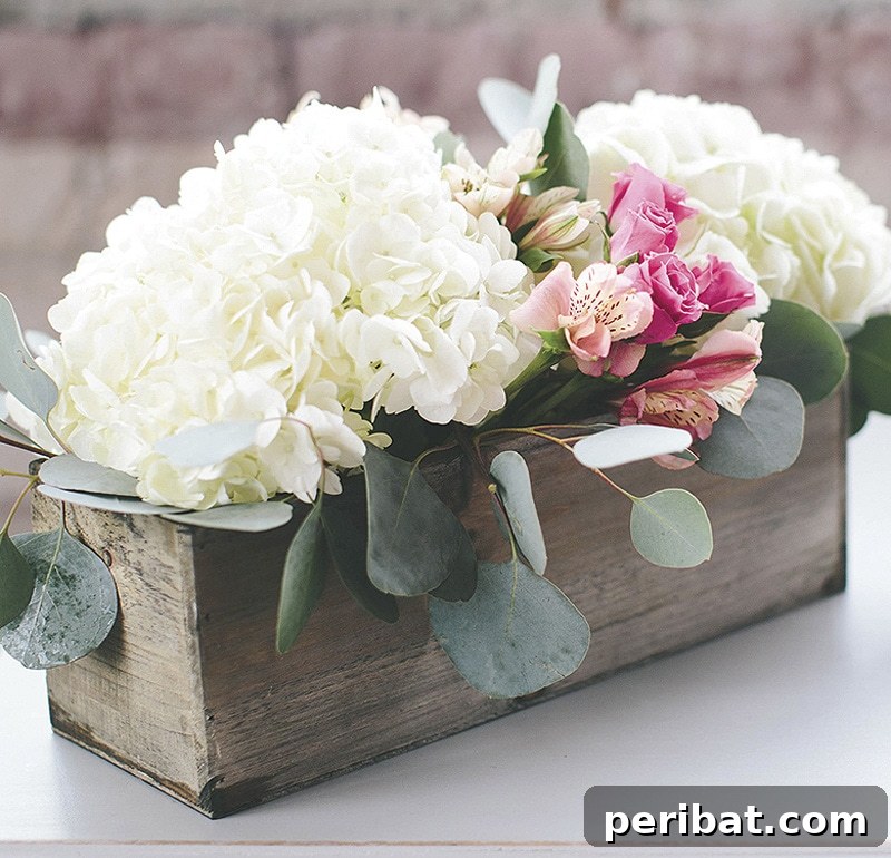 Elegant modern DIY hydrangea centerpiece with champagne alstroemeria