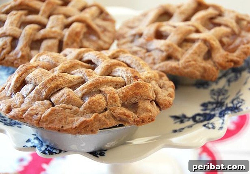Delicious miniature pie party favors, individually wrapped and customizable for any event.