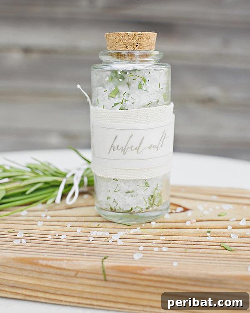 Herbed salt favors elegantly packaged in small glass jars, a gourmet DIY gift.