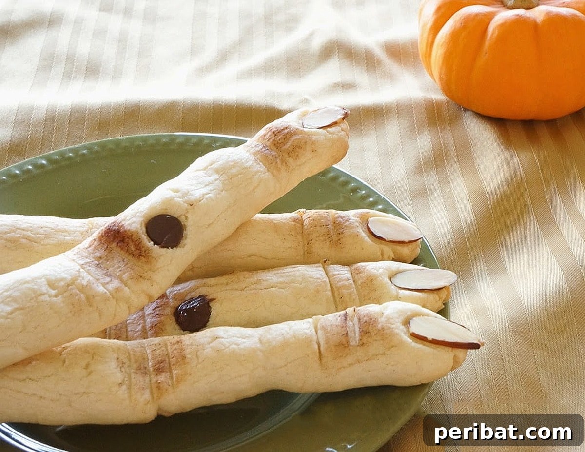 42 Spooktacular DIY Halloween Cookie Treats 12 Spooky witch fingers sugar cookies with almond nails