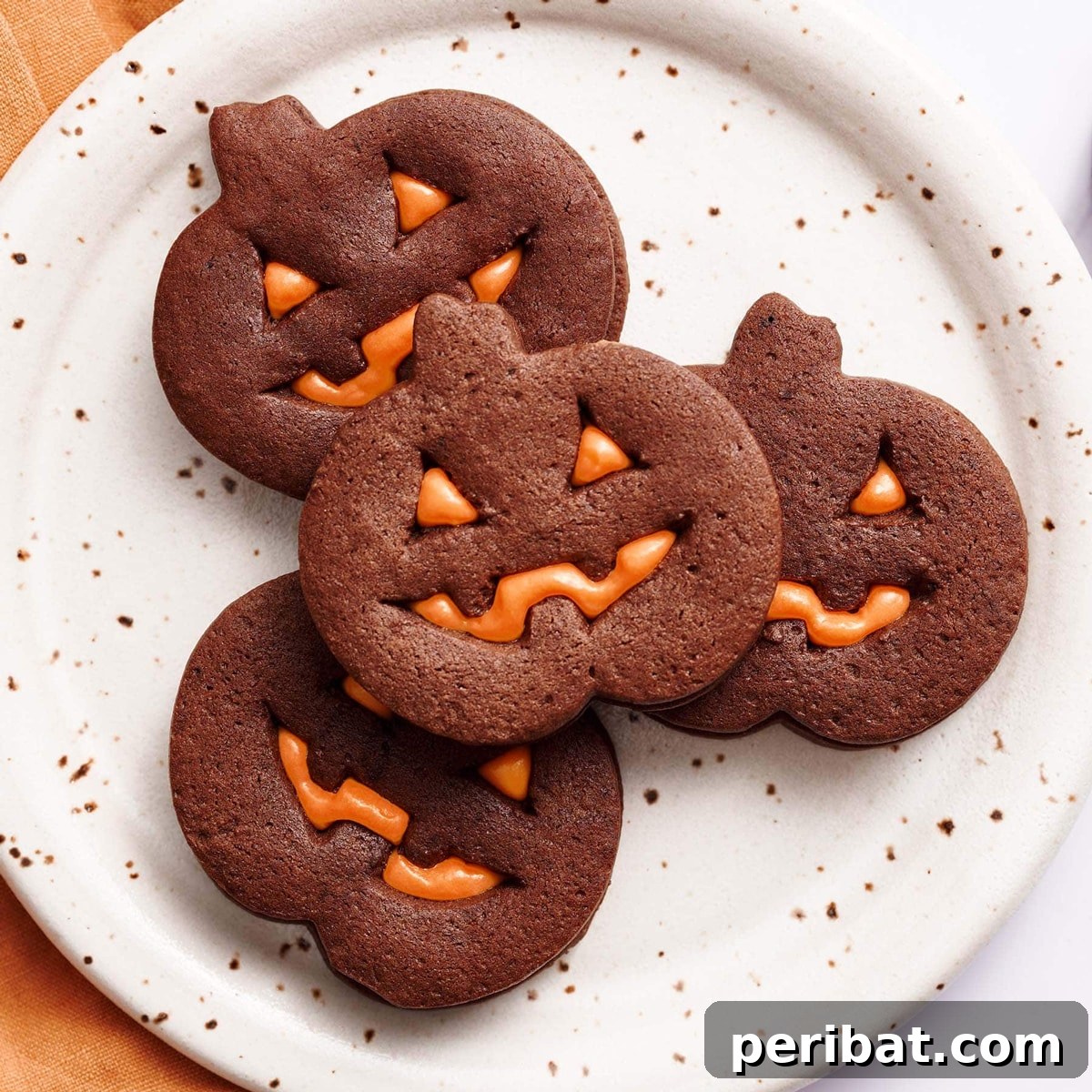 42 Spooktacular DIY Halloween Cookie Treats 25 Jack-O’-Lantern chocolate sugar cookies