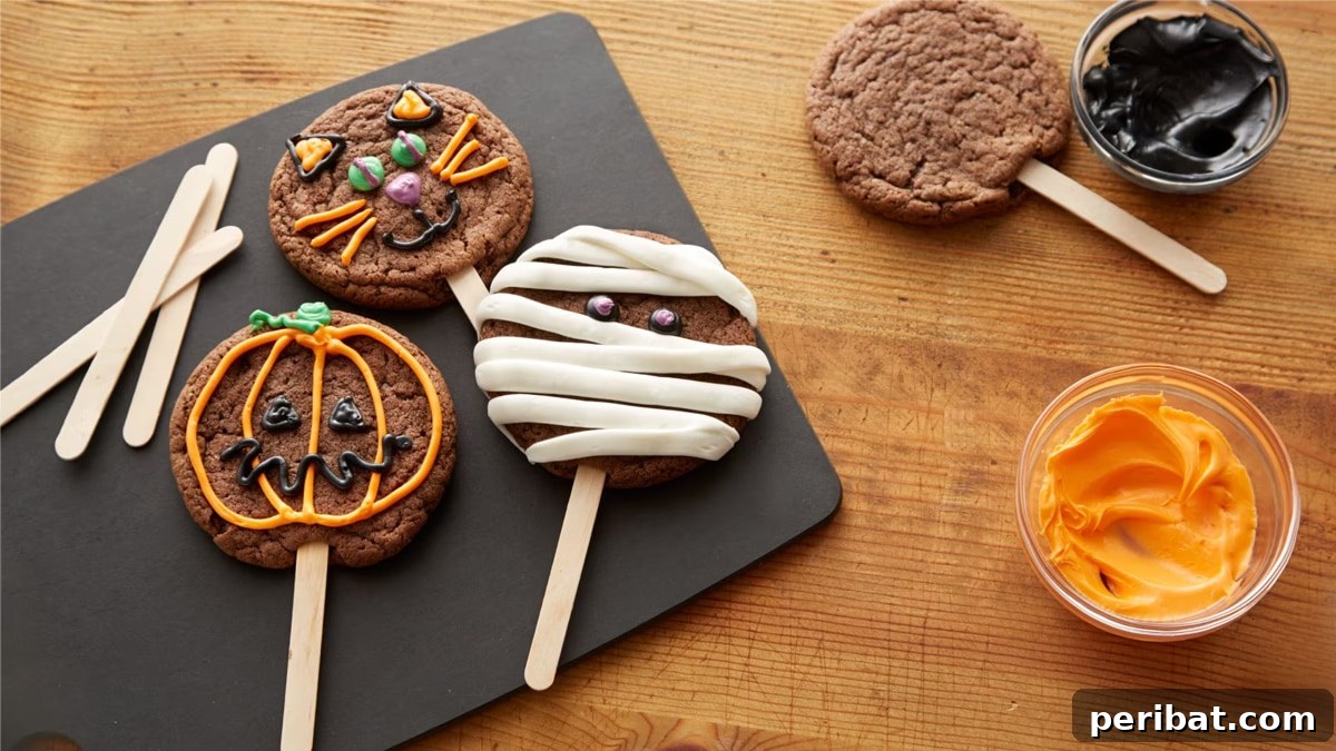 42 Spooktacular DIY Halloween Cookie Treats 26 Halloween cookies on a stick