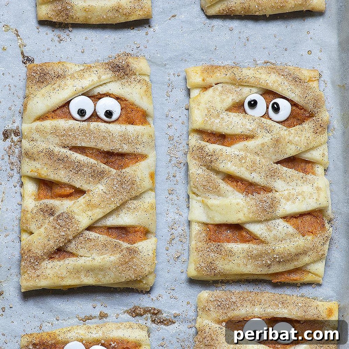 42 Spooktacular DIY Halloween Cookie Treats 34 Mummy-shaped pumpkin cookies