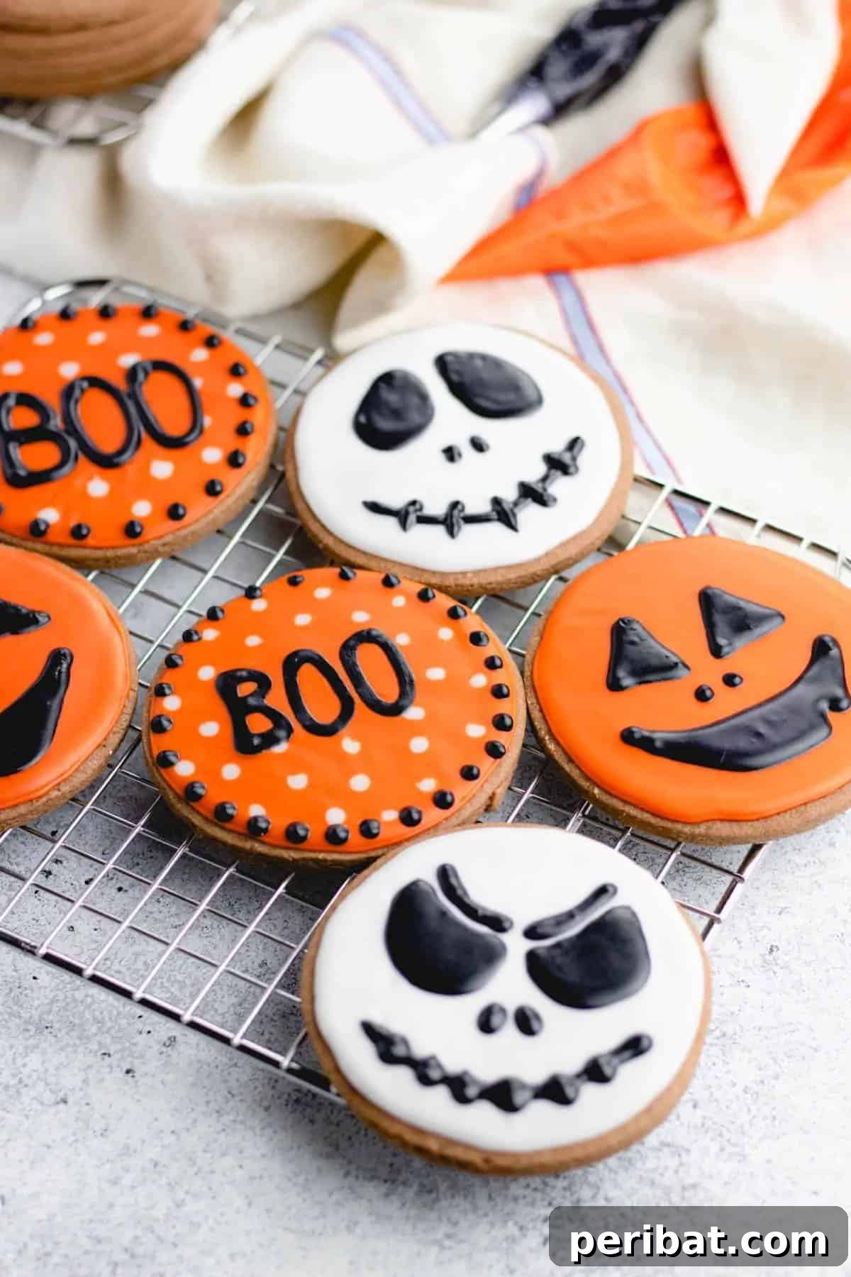 42 Spooktacular DIY Halloween Cookie Treats 36 Spooky Halloween sugar cookies with freehand designs